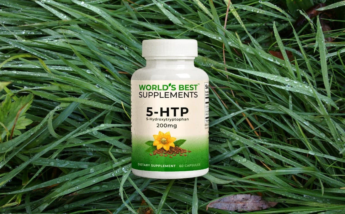 A bottle of World's Bests Supplements 5-HTP capsules laying on wet grass.
