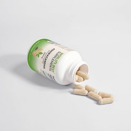 A bottle of Ashwagandha 650mg capsules with Black Pepper tipped over showing the cpasules on a table, from World's Best Supplements.