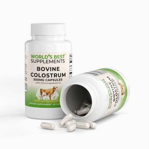 Two bottles of Bovine Colostrum Capsules in 500mg strength featuring 30% Immunoglobulin G from World's Best Supplements with one of the bottles tipped over showing the capsules.