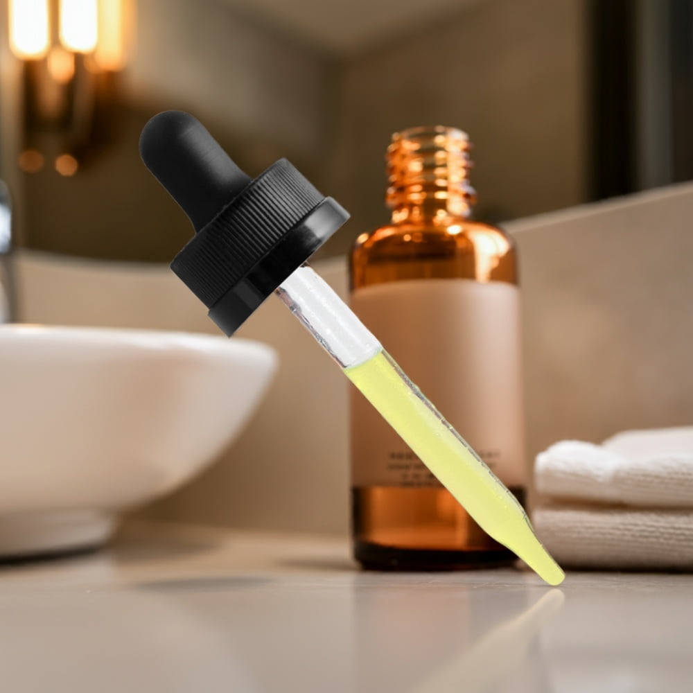 a closeup of the dropper from the Liposomal Hair Growth Oil from World's Best Supplements.