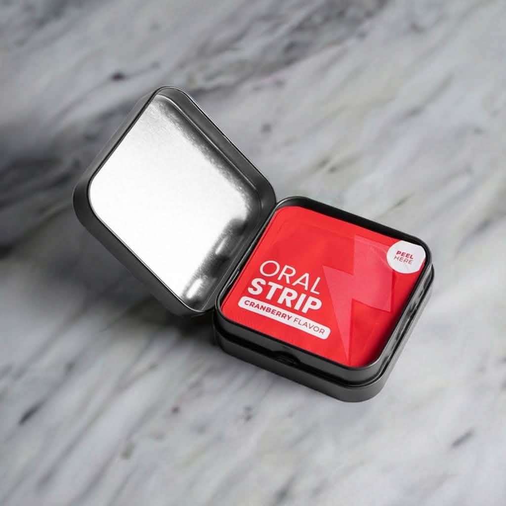 An open tin of B-12 (1,000mcg) Energy Strips in Juicy Cranberry Flavor from World's Best Supplements.