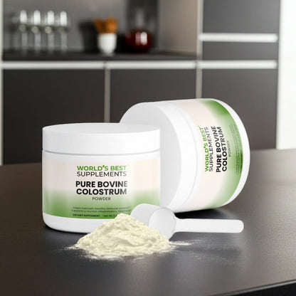 Two bottles of Bovine Colostrum Powder with the Scooper on a counter.
