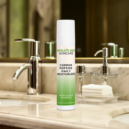 A 1.7oz bottle of Copper Peptide Daily Moisturizer from World's Best Supplements skincare line with Aloe Vera and Vitamin E.