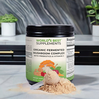 A tub of Organic Fermented Mushroom Complex with the scooper and a pile of powder laying in front of if, from World's Best Supplements.