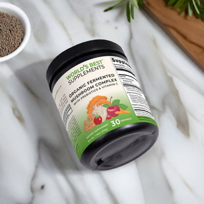 A tub of Organic Fermented Mushroom Complex with Prebiotics and Vitamin C laying on a counter by World's Best Supplements.