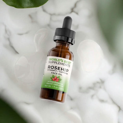 A bottle of Rosehip Face Oil laying on a bathroom counter.